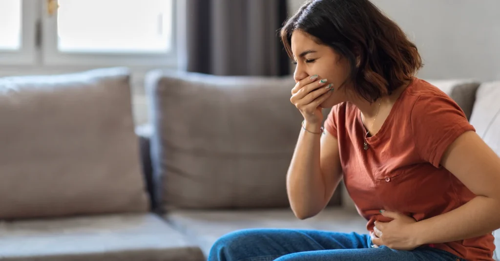 portrait-young-arab-woman-suffering-from-nausea